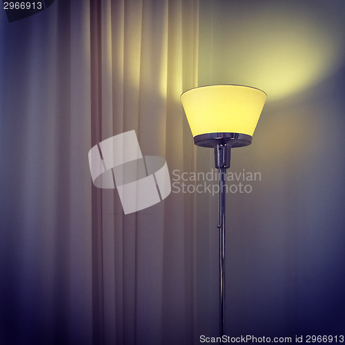 Image of Modern lamp in a dark room