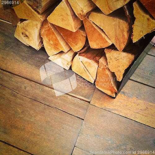 Image of Firewood on old rustic floor