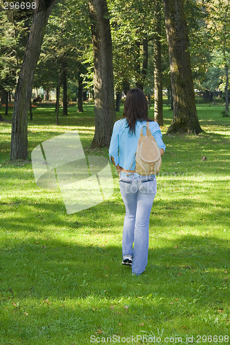 Image of Young woman in a forest