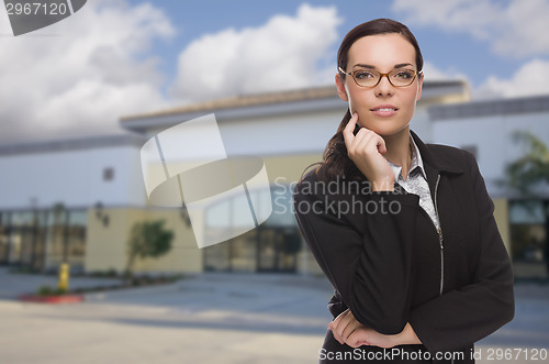 Image of Woman In Front of Commercial Building