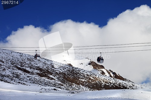 Image of Gondola lifts at evening