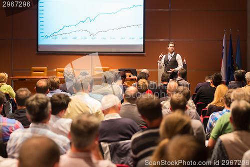 Image of Speaker at Business Conference and Presentation.