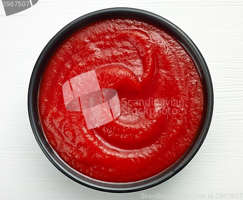 Image of bowl of ketchup or tomato sauce