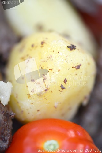 Image of Fried pork liver with tomatoes and potatoes