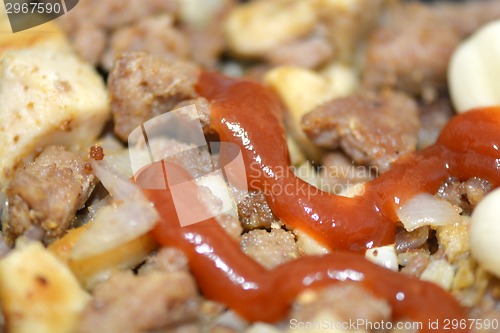 Image of Fried pork liver with tomatoes and potatoes
