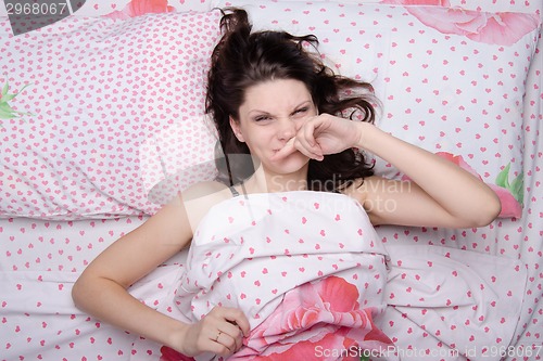 Image of Girl waking cheshit your nose