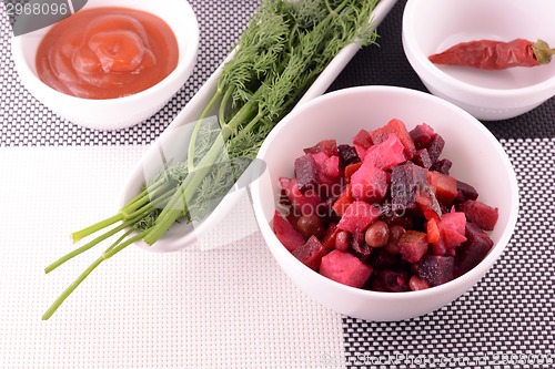 Image of tasty vinaigrette on a white plate