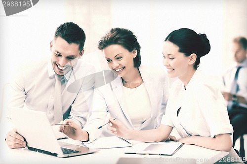 Image of business team having discussion in office