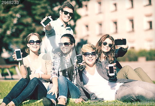 Image of students showing smartphones