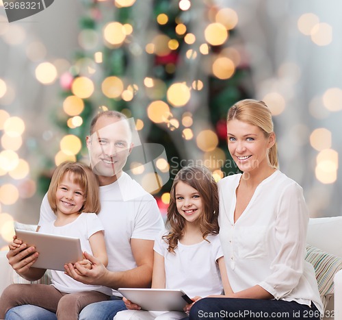 Image of happy family with tablet pc computers