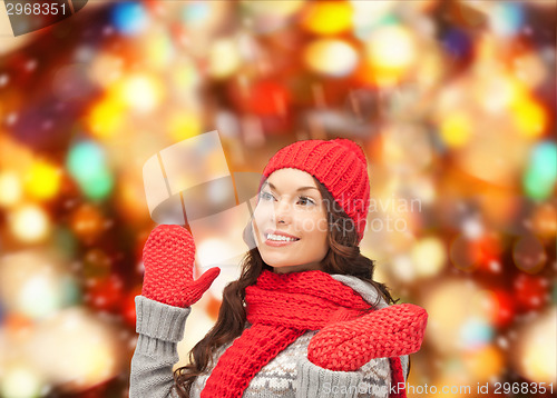 Image of smiling young woman in winter clothes