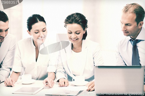 Image of business team having discussion in office