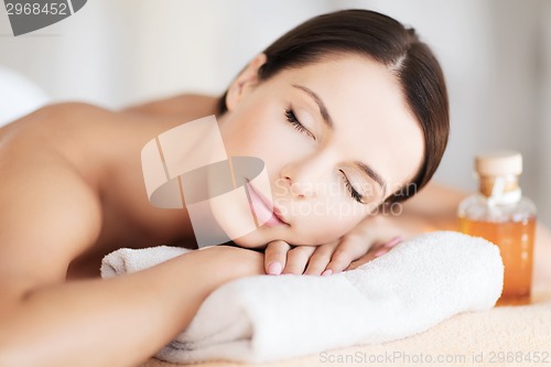 Image of happy woman in spa salon