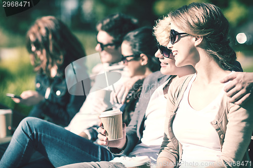 Image of group of students or teenagers hanging out