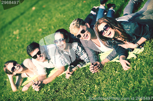 Image of group of students or teenagers hanging out