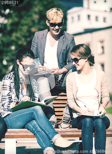 Image of group of students or teenagers hanging out