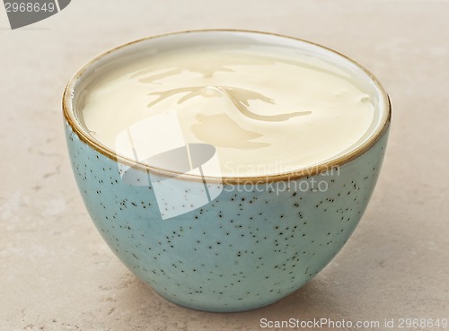 Image of bowl of peach yogurt