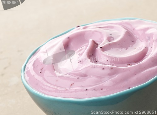 Image of bowl of pink blueberry yogurt