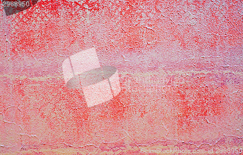 Image of Plastered red-purple wall as an abstract background