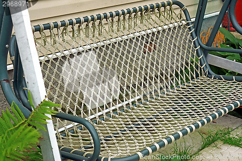 Image of Garden wicker swings closeup