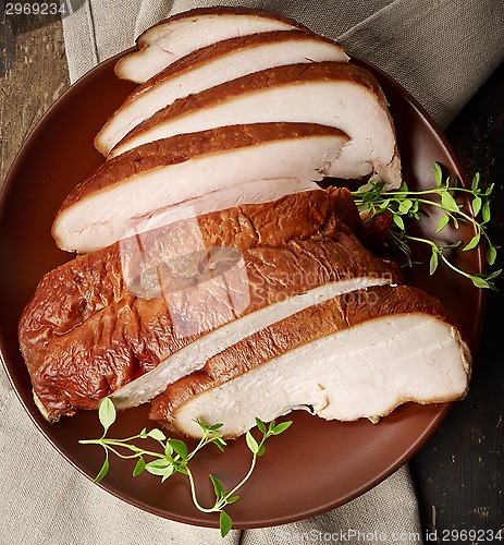 Image of sliced smoked chicken meat