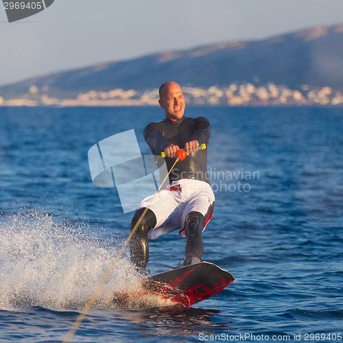 Image of Wakeboarder in sunset.