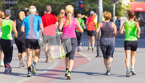 Image of Group of people running.