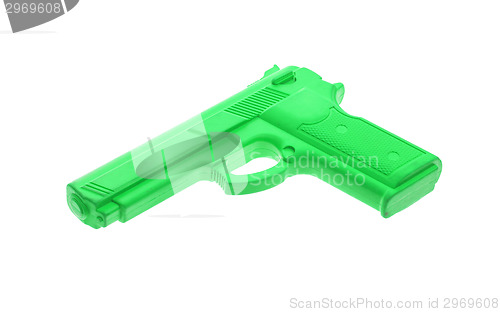 Image of Green training gun isolated on white