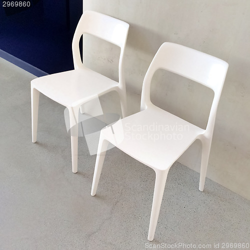 Image of White chairs with modern design