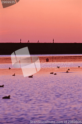 Image of Riding by lake