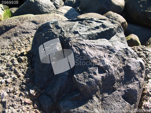 Image of Dark  grey metalic star stone