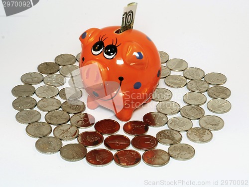 Image of Bunch of coins and piggy bank