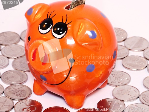 Image of Bunch of coins and piggy bank