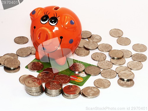 Image of Bunch of coins and piggy bank