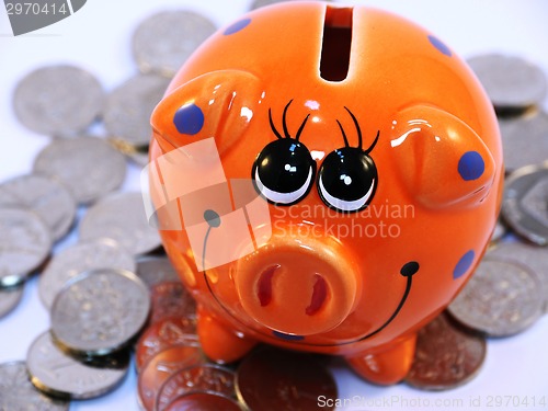 Image of Bunch of coins and piggy bank