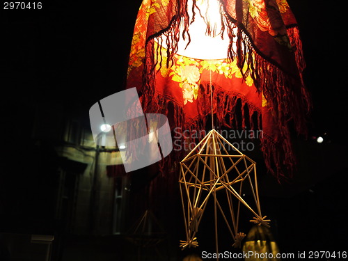 Image of Stained glass lamp shot at night.