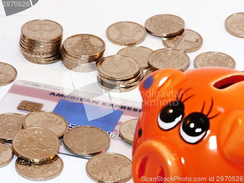 Image of Bunch of coins and piggy bank