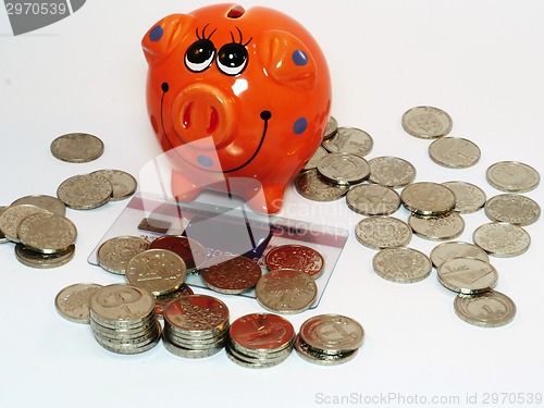 Image of Bunch of coins and piggy bank