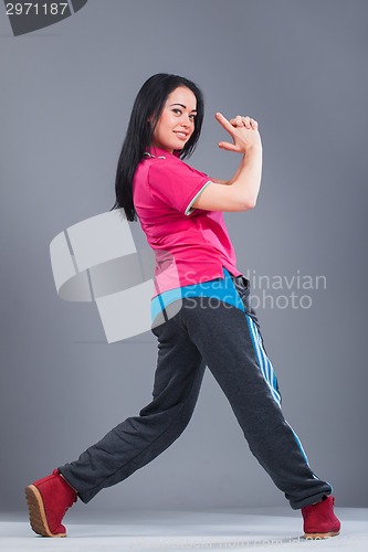 Image of Young and beautiful woman dancer