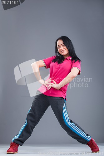 Image of Young and beautiful woman dancer