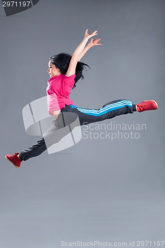 Image of Young and beautiful woman dancer