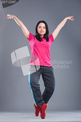 Image of Young and beautiful woman dancer