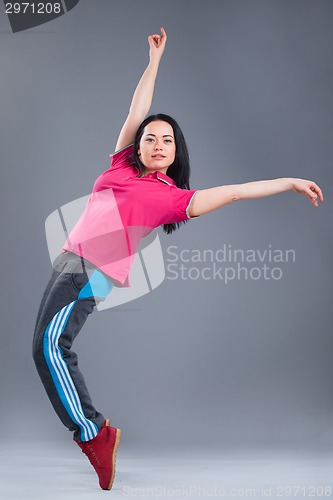 Image of Young and beautiful woman dancer