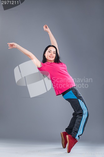 Image of Young and beautiful woman dancer