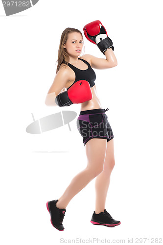 Image of Young blonde wearing boxing gloves