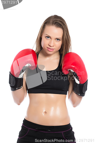 Image of Beautiful woman posing with boxing gloves