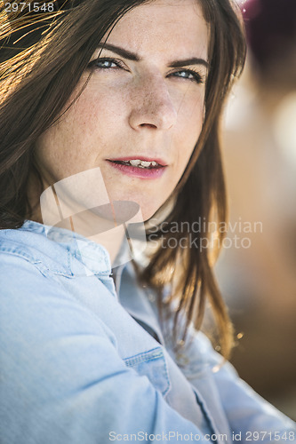 Image of Brunette with fluttering hair