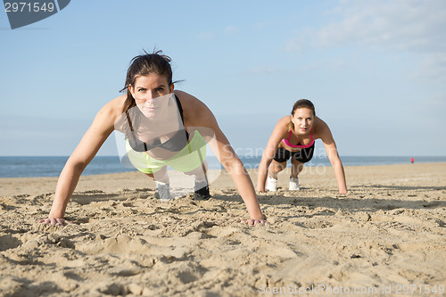 Image of Push ups on a beach