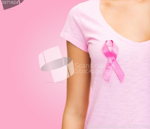 Image of close up of woman with cancer awareness ribbon