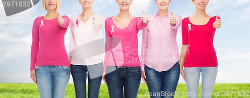 Image of close up of women with cancer awareness ribbons